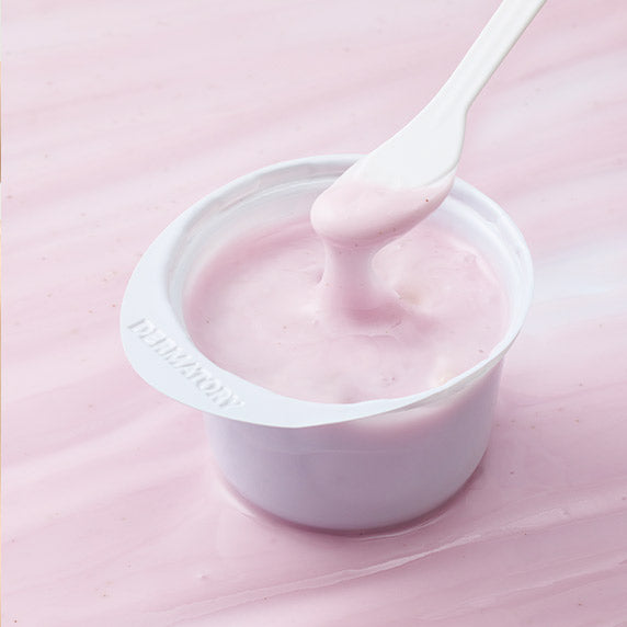 DERMATORY Modeling Pack 66g de la marque DERMATORY, texture crème rose dans une coupelle, photo produit en salle de soins.