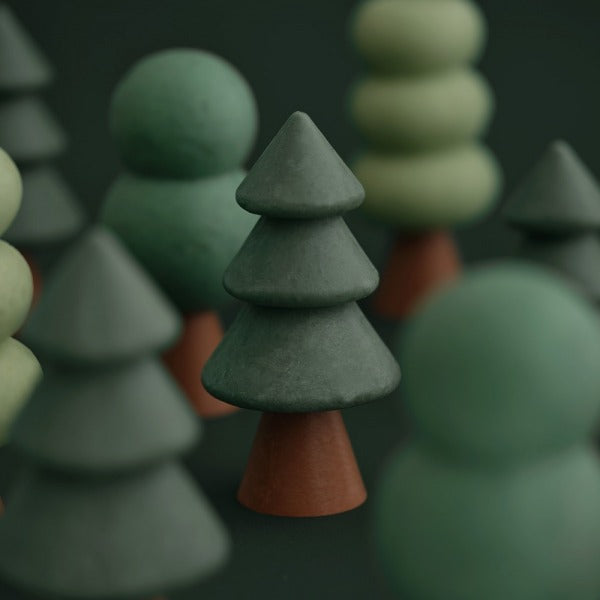 Décris l'image en français en mentionnant le produit, la marque et le contexte visuel : DONGGUBAT Forest Village Woody Perfume Bar Set (Bloom Wood+Herb Wood+Juicy Wood)