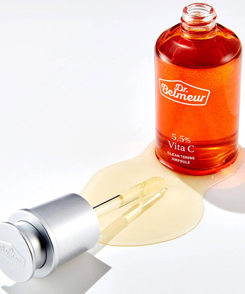 DR.BELMEUR Vita C Clean Toning Ampoule 45ml, flacon orange sur peau, marque Dr.Belmeur, contexte cosmétique.