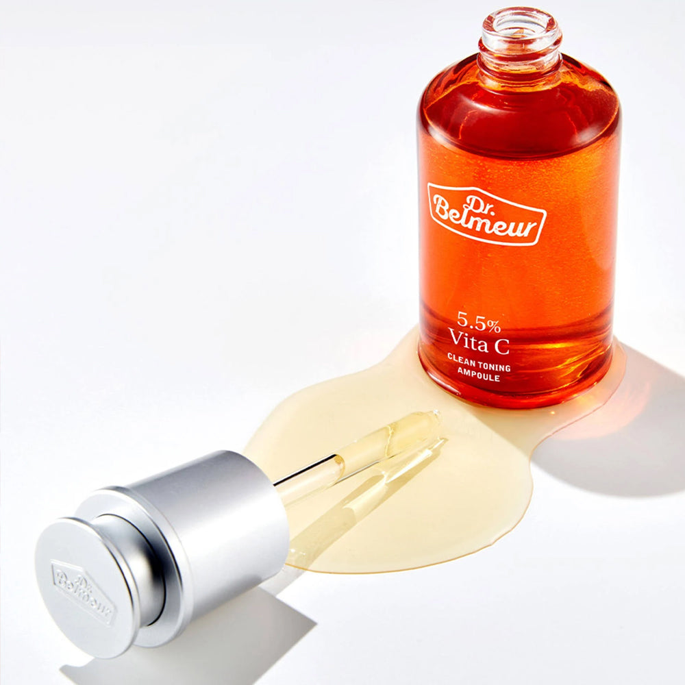 DR.BELMEUR Vita C Clean Toning Ampoule 45ml, flacon orange sur peau, marque Dr.Belmeur, contexte cosmétique.