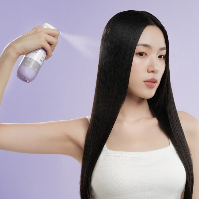 Décris l'image en français: Dr.G Scalp Lab Sera-LPT Clinic No-Wash Treatment 200mL, flacon Dr.G, femme aux cheveux noirs, sans lavage.