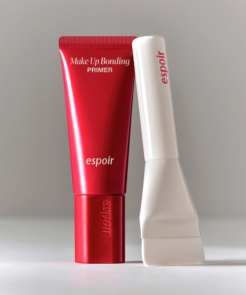 ESPOIR Make Up Bonding Primer, tube rouge et blanc sur fond clair, amorce maquillage de la marque espoir en studio.