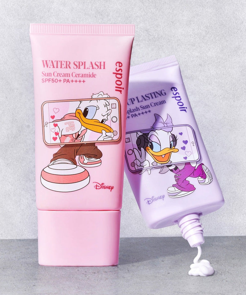 ESPOIR Water Splash Sunscreen Tone Up Lasting [Disney Edition] : tubes rose et violet Disney, crème SPF sur fond clair.