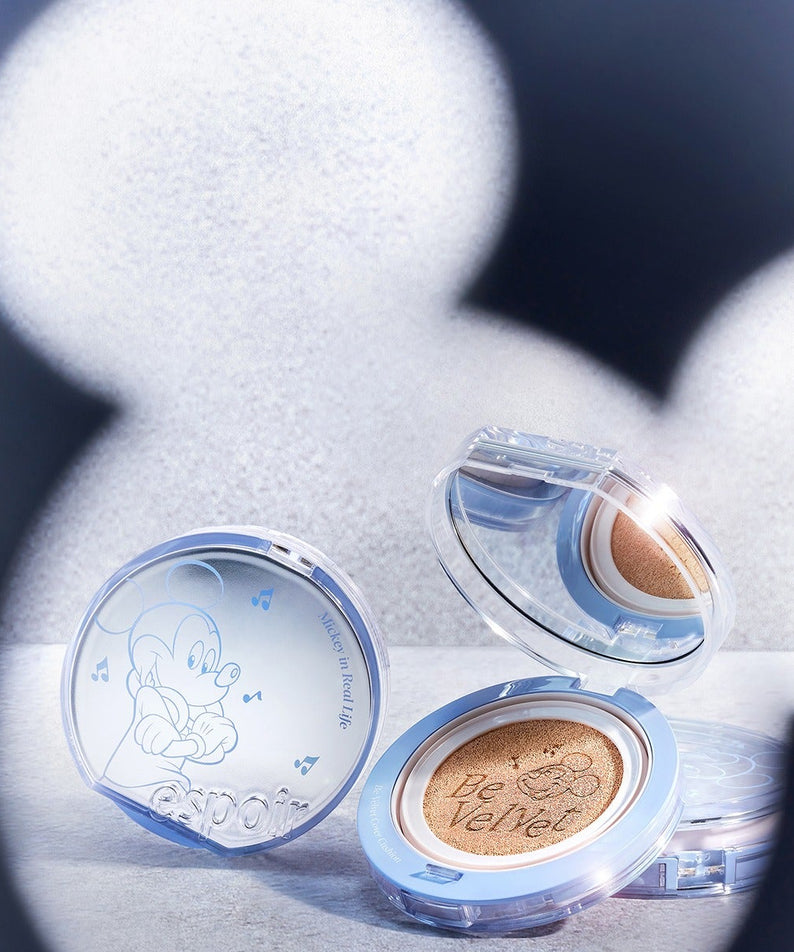ESPOIR Bevelvet Cover Cushion SPF42/PA++ [Disney Edition] avec design inspiré de Disney, fond de teint compact élégant.