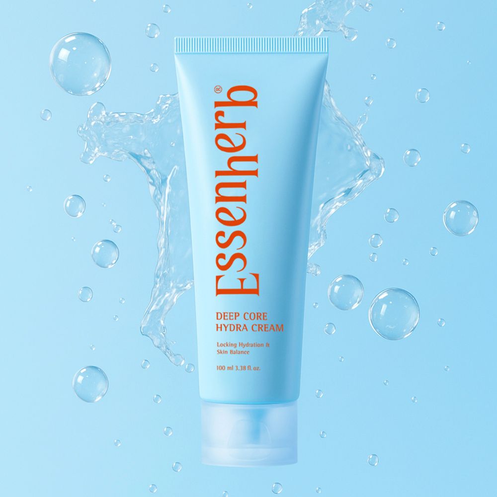 ESSENHERB Deep Core Hydra Cream 100ml, crème hydratante en tube sur fond bleu avec éclaboussures d’eau (visuel produit)