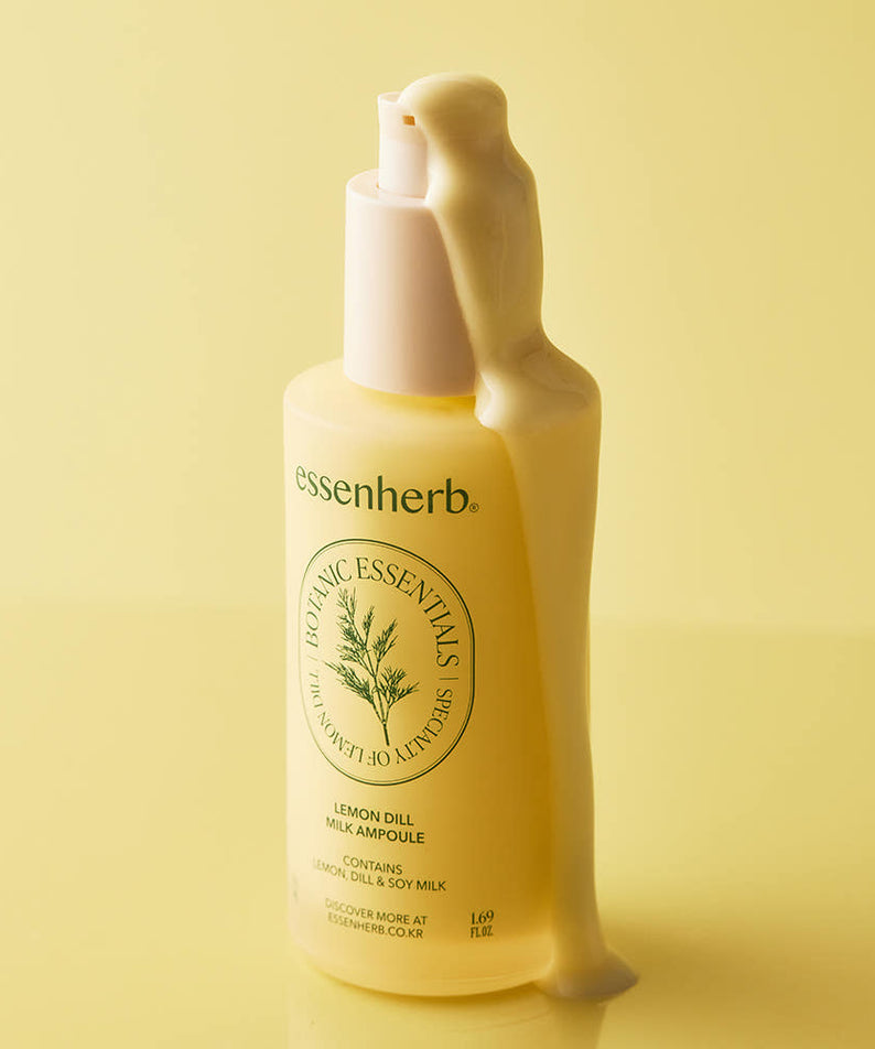 ESSENHERB Lemon Dill Milk Ampoule 50ml, flacon crème sur fond jaune, marque ESSENHERB, contexte cosmétique.