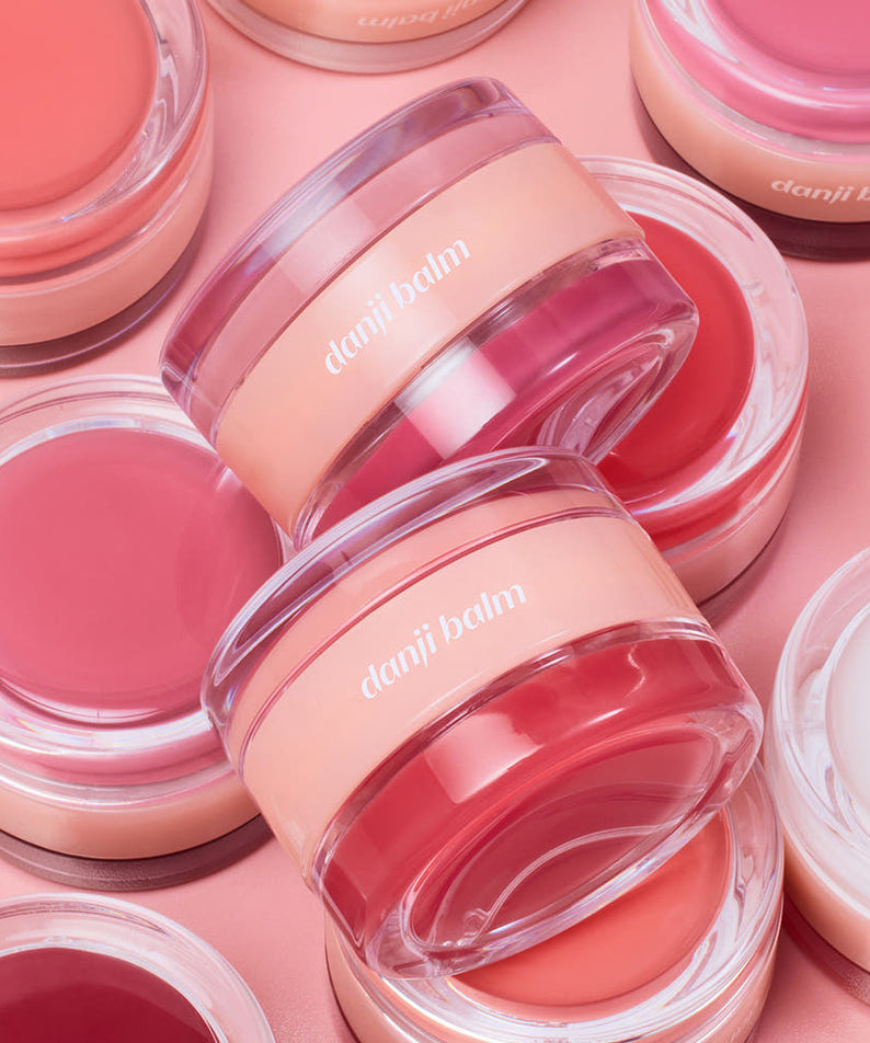 ETUDE  Danji Balm 30g de la marque ETUDE, baumes roses en pots transparents sur fond rose pastel.