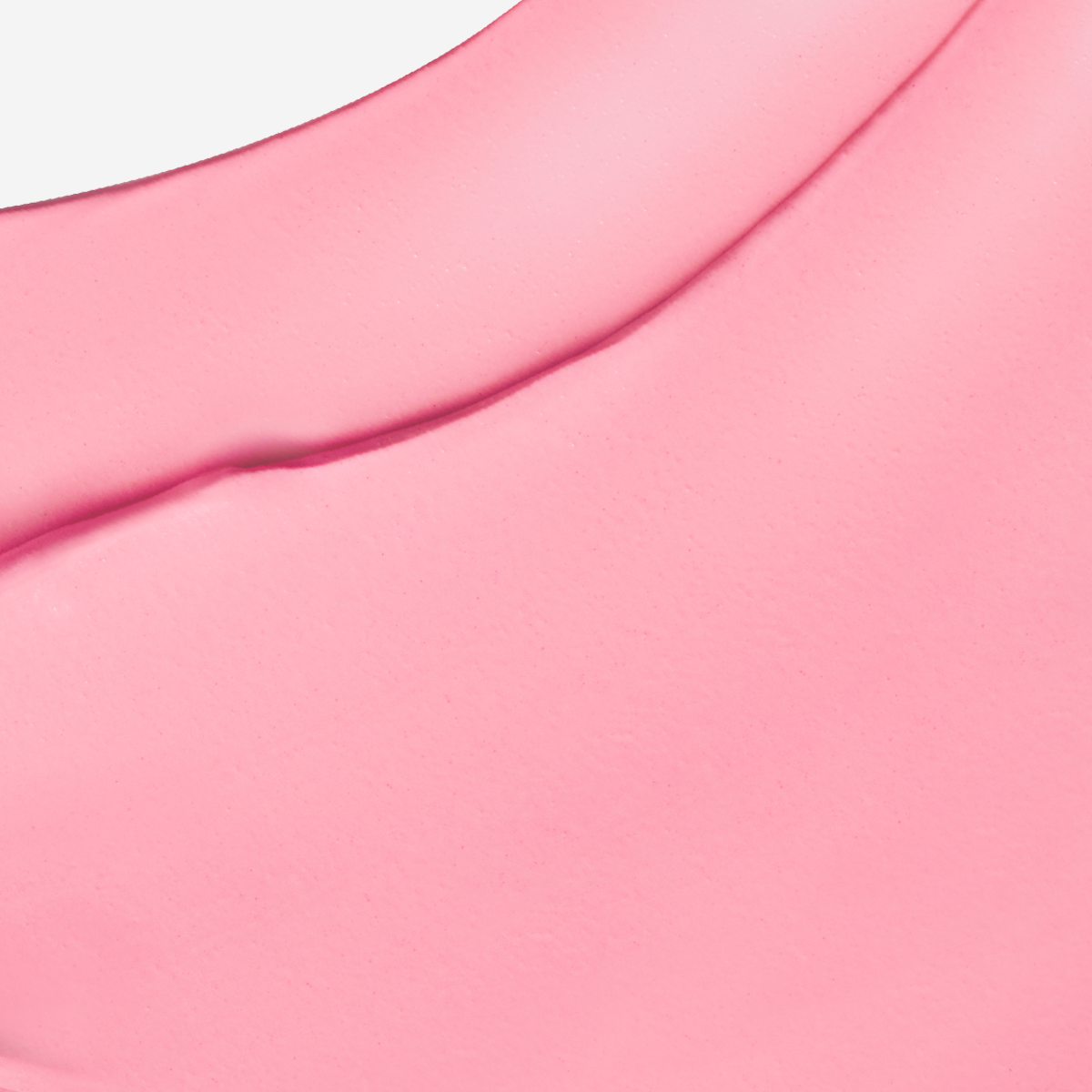 Décris l'image en français: FEEV Fluffy Cheek Blush 10g, texture rose du blush, marque FEEV, gros plan cosmétique.