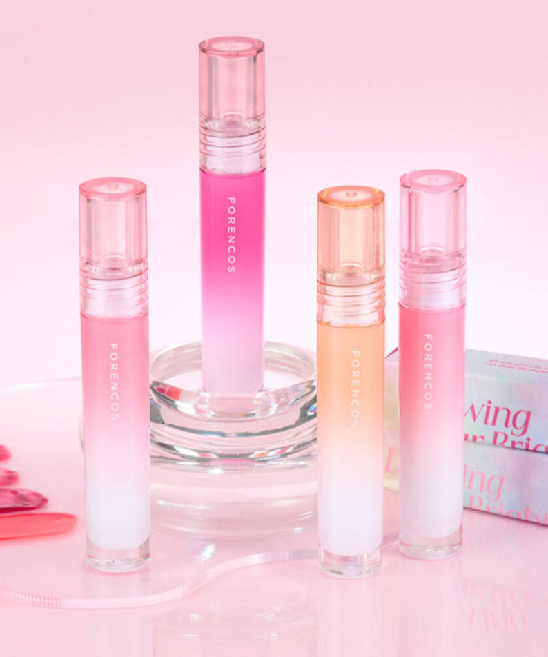 Ensemble de FORENCOS All Light Mood Glow Tint sur fond rose, rehaussez la luminosité de vos lèvres avec ces nuances éclatantes.