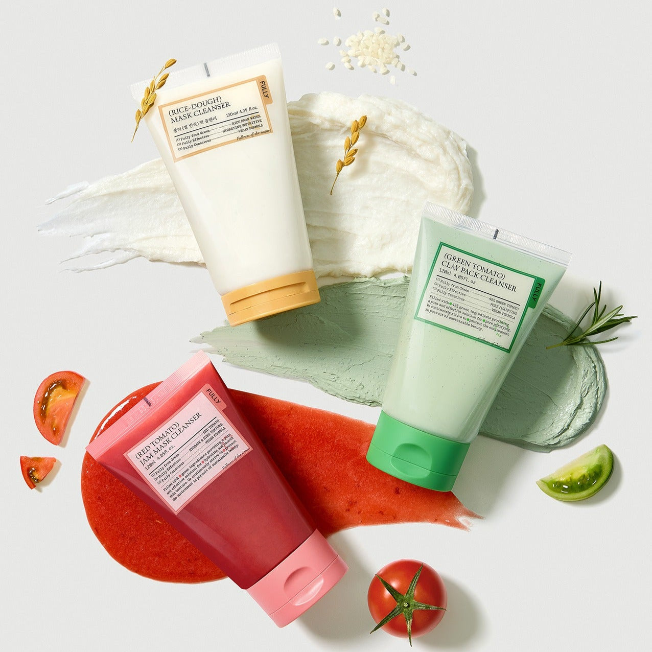 FULLY  Fully Pack Cleanser 3-piece set : produits FULLY sur serviette, légumes et fleurs, fond clair.
