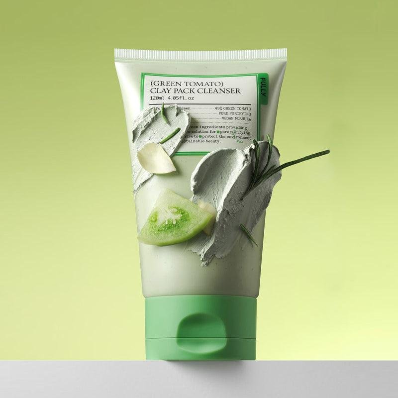 FULLY Green Tomato Clay Pack Cleanser 120ml, tube vert sur fond vert avec tomate et feuilles, nettoyage visage.