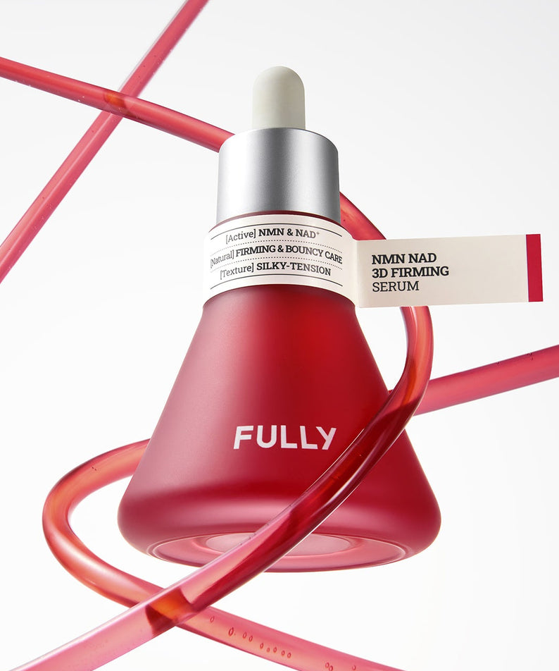 FULLY  NMN NAD Elasticity Serum de la marque FULLY, flacon rouge sur fond blanc avec rubans rouges croisés
