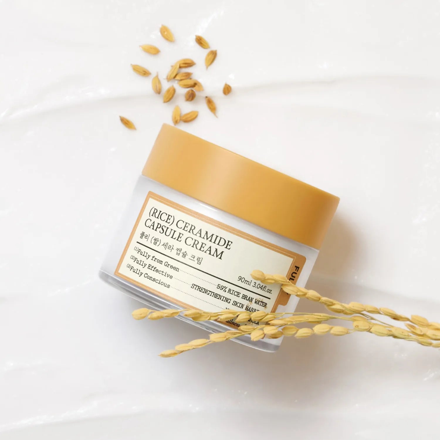 FULLY  Rice Sera Capsule Cream 90ml de la marque FULLY, pot beige sur fond blanc avec grains de riz dorés.