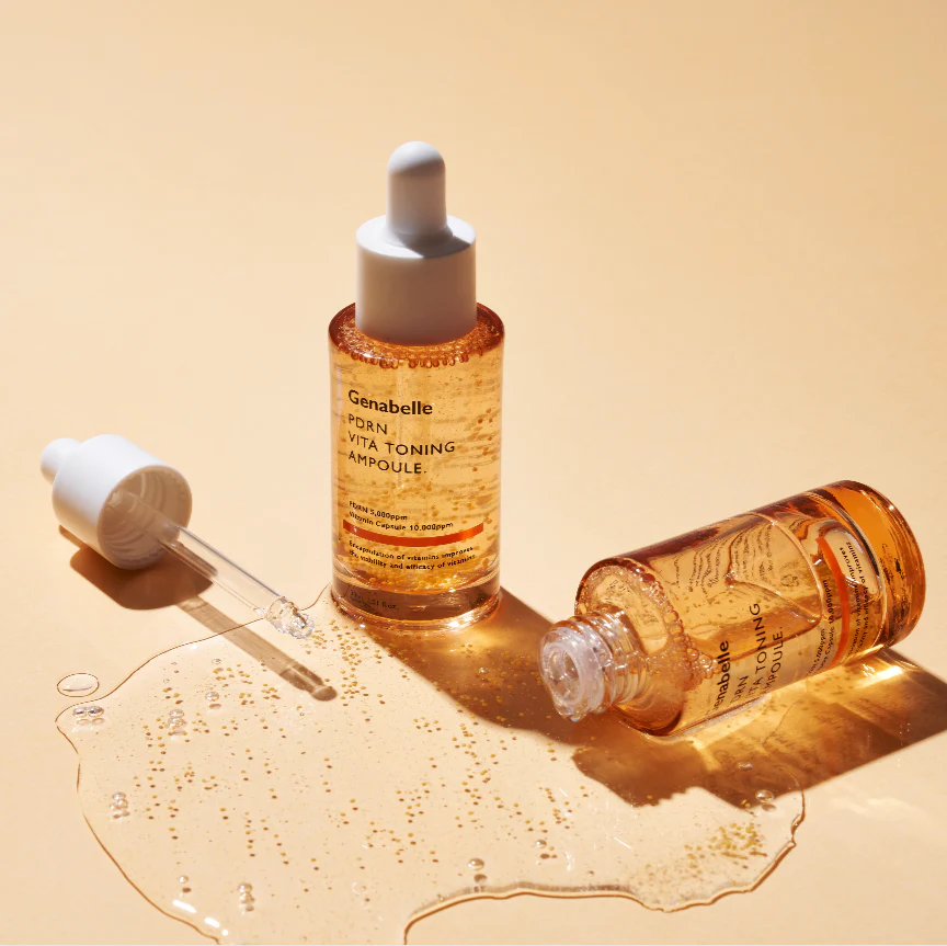 GENABELLE PDRN Vita Toning Ampoule 70ml Genabelle, flacon sérum vitaminé sur fond beige avec pipette et gouttes