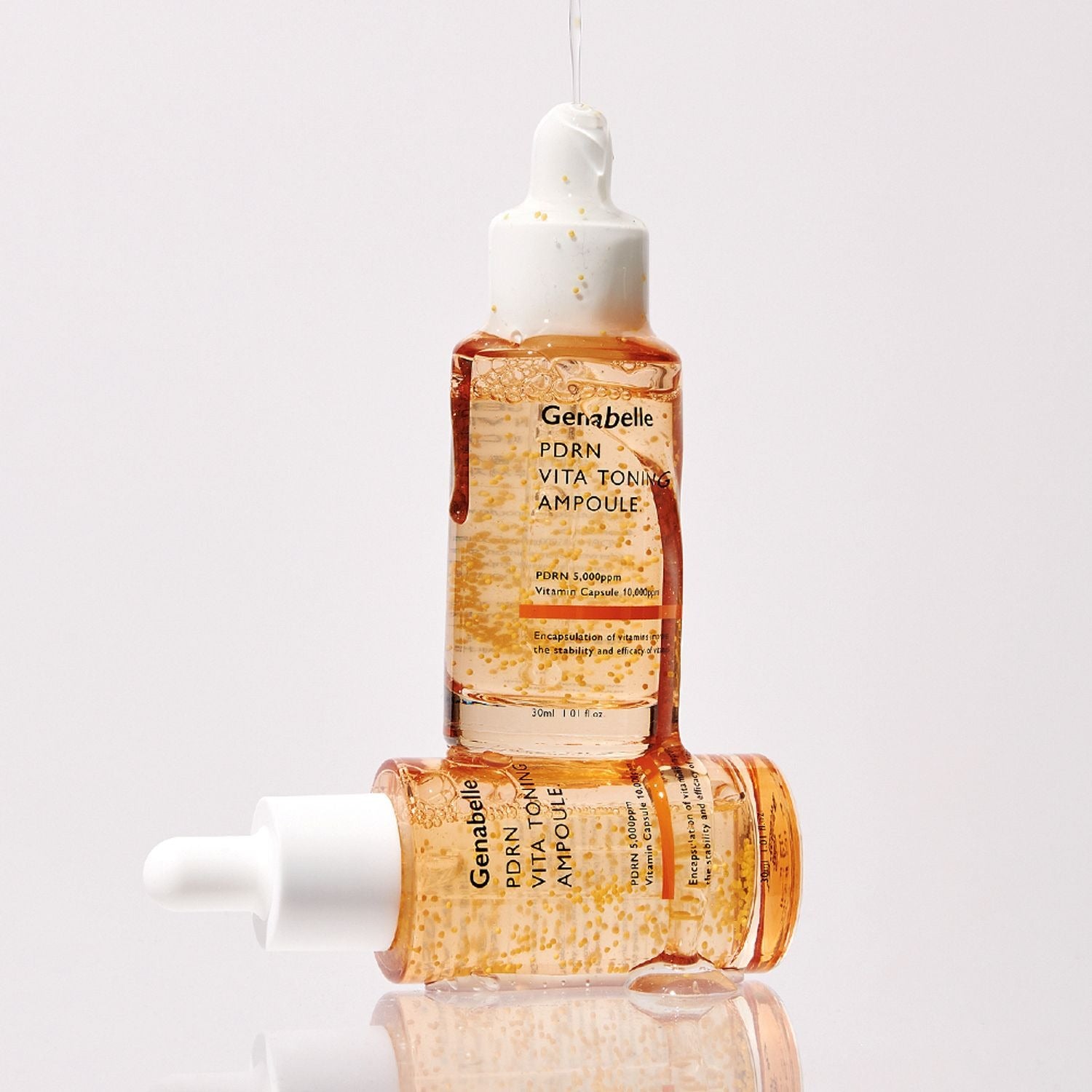 GENABELLE PDRN Vita Toning Ampoule 70ml de la marque Genabelle, sur fond clair, ampoules de sérum orange en contexte beauté.