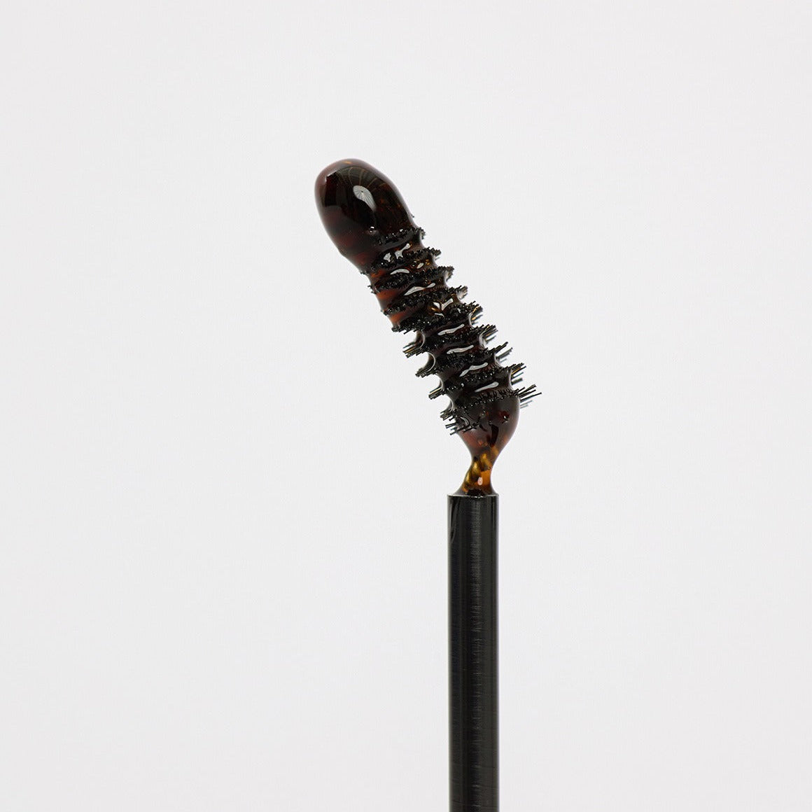 GLPHYO Eyebrow Fixing Cara 5g, brosse à mascara sourcils de la marque, sur fond blanc, texture gélifiée