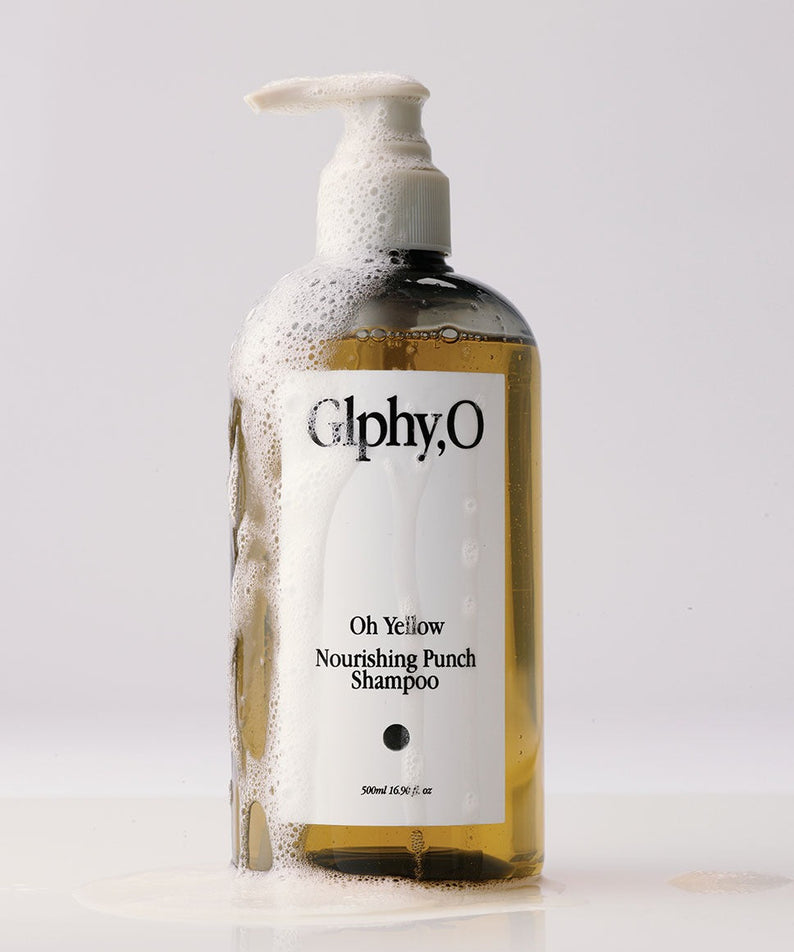 GLPHYO Oh Yellow Nourishing Punch Shampoo 300ml de la marque GlphyO, bouteille dorée sur fond clair, vue produit.