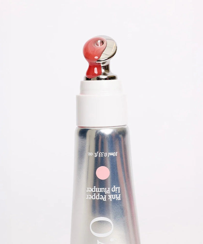 GLPHYO Pink Pepper Lip Plumper 10ml, flacon cosmétique rose avec embout applicateur, photo produit sur fond clair.