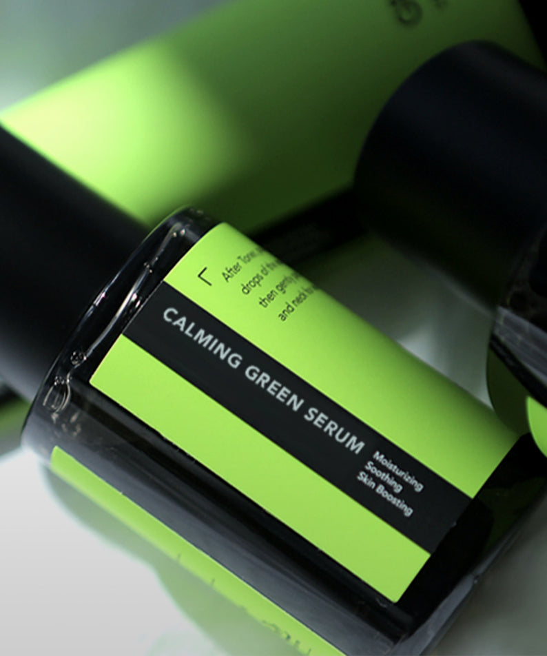GRAFEN Calming Green Serum 50ml, flacon vert sur fond clair, ambiance spa, étiquette visible.