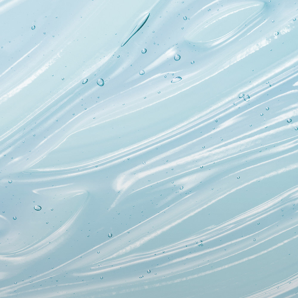 GRAFEN  Cica Silky Shampoo 500ml : flacon sur fond bleu, texture effet soie, gouttes d’eau en visuel.