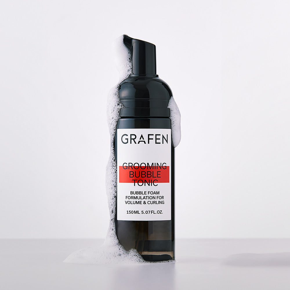 GRAFEN  Grooming Bubble Tonic 150ml, bouteille noire sur fond clair, mousse blanche visible sur l’image.