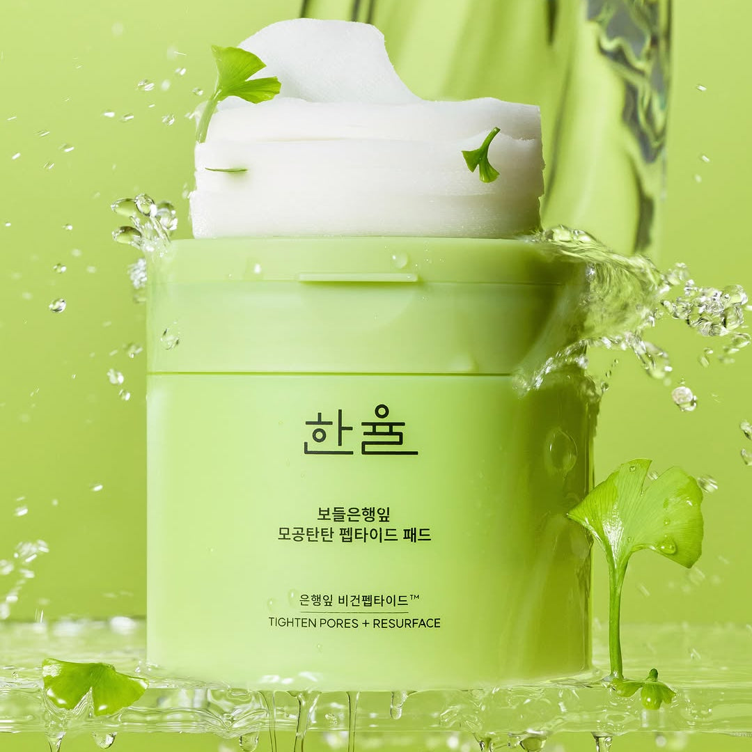 HANYUL Bodeunhaengip Pore Elasticity Peptide Pads 60 Sheets 100ml, boîte sur fond vert éclaboussures, contexte spa beauté