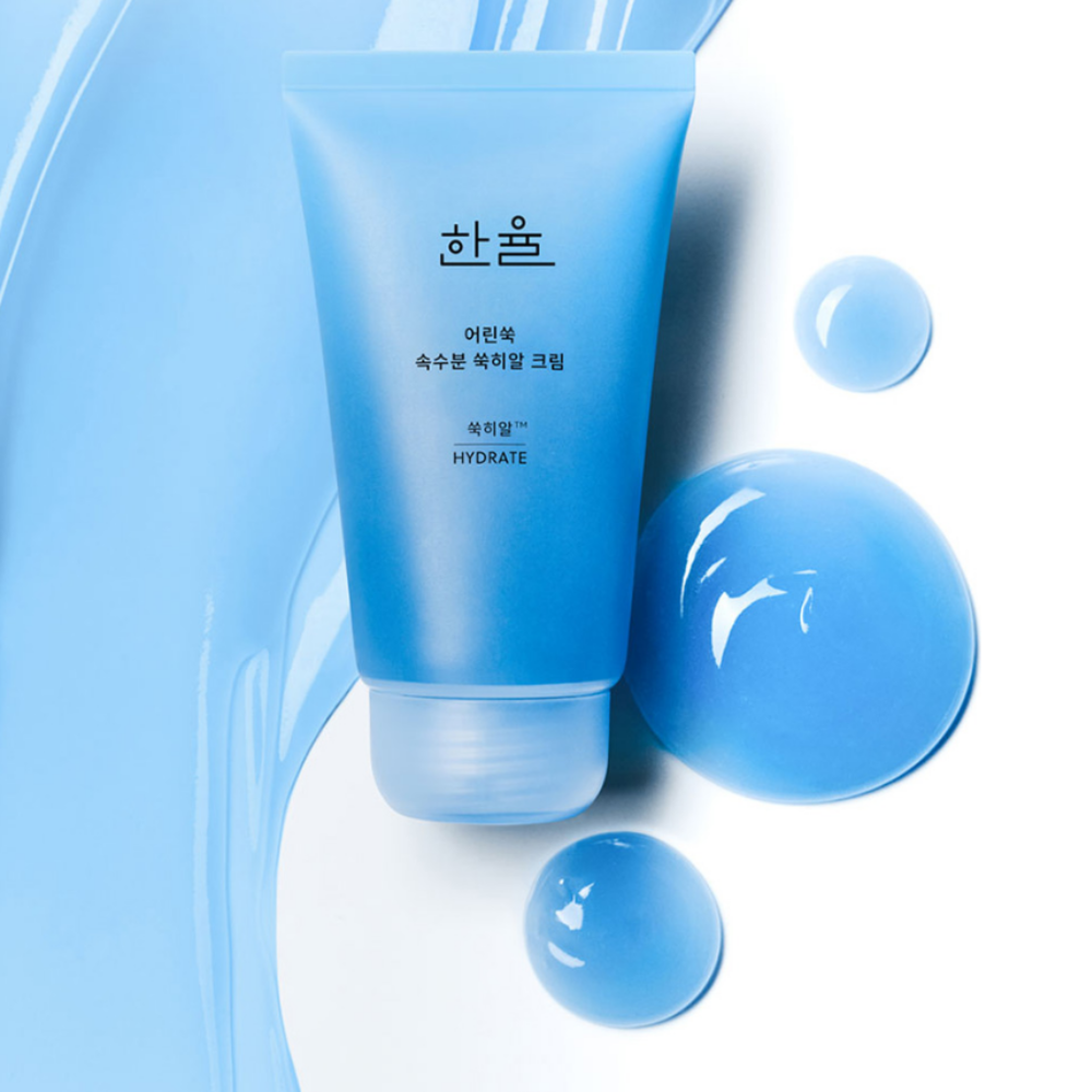 HANYUL Young Artemisia Extract Moisturizing Cream 60ml, tube HANYUL sur fond bleu avec gouttes, produit cosmétique hydratant