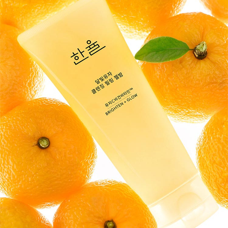 HANYUL Yuja Brightening Peeling Gel Balm Cleanser 100g, gel nettoyant coréen à la pulpe de yuzu, packaging sur fruits d’orange
