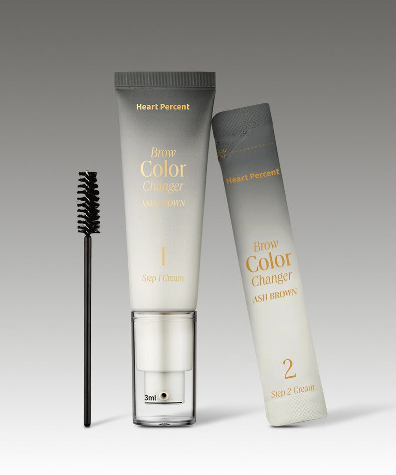 HEART PERCENT Brow Color Changer Ash Brown 20ml, Heart Percent, flacon et tube sur fond gris, avec pinceau