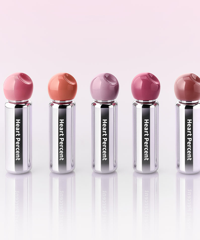 HEART PERCENT Dot On Mood First Tint 3.4g, visuels sur fond clair avec tubes et bouchons colorés.