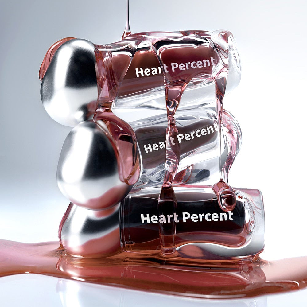 HEART PERCENT Dot On Mood Over Melting Gloss, en cœur de gloss rouge, marque HEART PERCENT, fond blanc visuel.