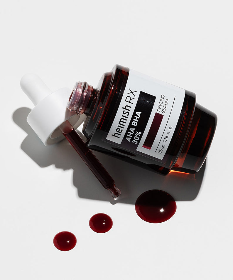 Sérum peeling HEIMISH RX AHA BHA 35ml avec pipette et gouttes sur fond blanc, exfoliation et soin de la peau efficace