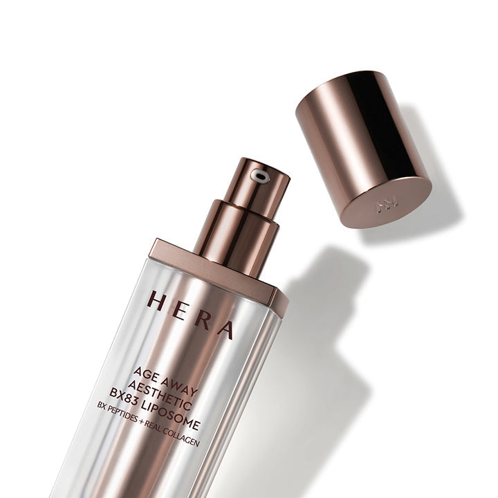 HERA  Age Away Aesthetic BX83 Liposome 40ml, flacon luxe avec pompe bronze sur fond clair, produit HERA cosmétique