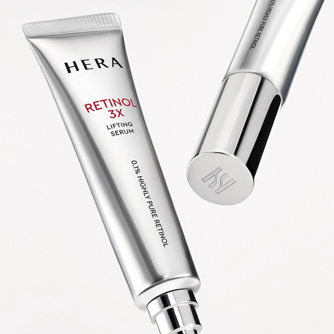 HERA Retinol 3X Lifting Serum 25ml de la marque HERA sur fond blanc, flacons et tube silver.