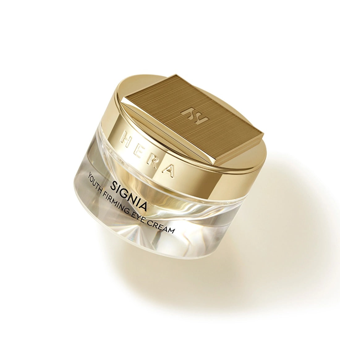 HERA Signa Youth Firming Eye Cream 30ml de HERA, flacon doré sur fond blanc, gros plan produit maquillage