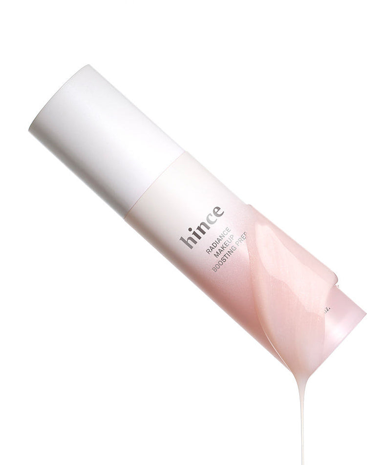 Décris l'image en français : HINCE  Radiance Makeup Boosting Prep 30ml, tube rose sur fond blanc, maquillage prêt.
