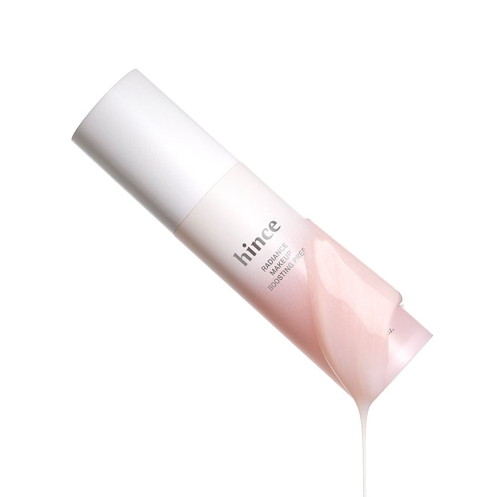 Décris l'image en français : HINCE  Radiance Makeup Boosting Prep 30ml, tube rose sur fond blanc, maquillage prêt.