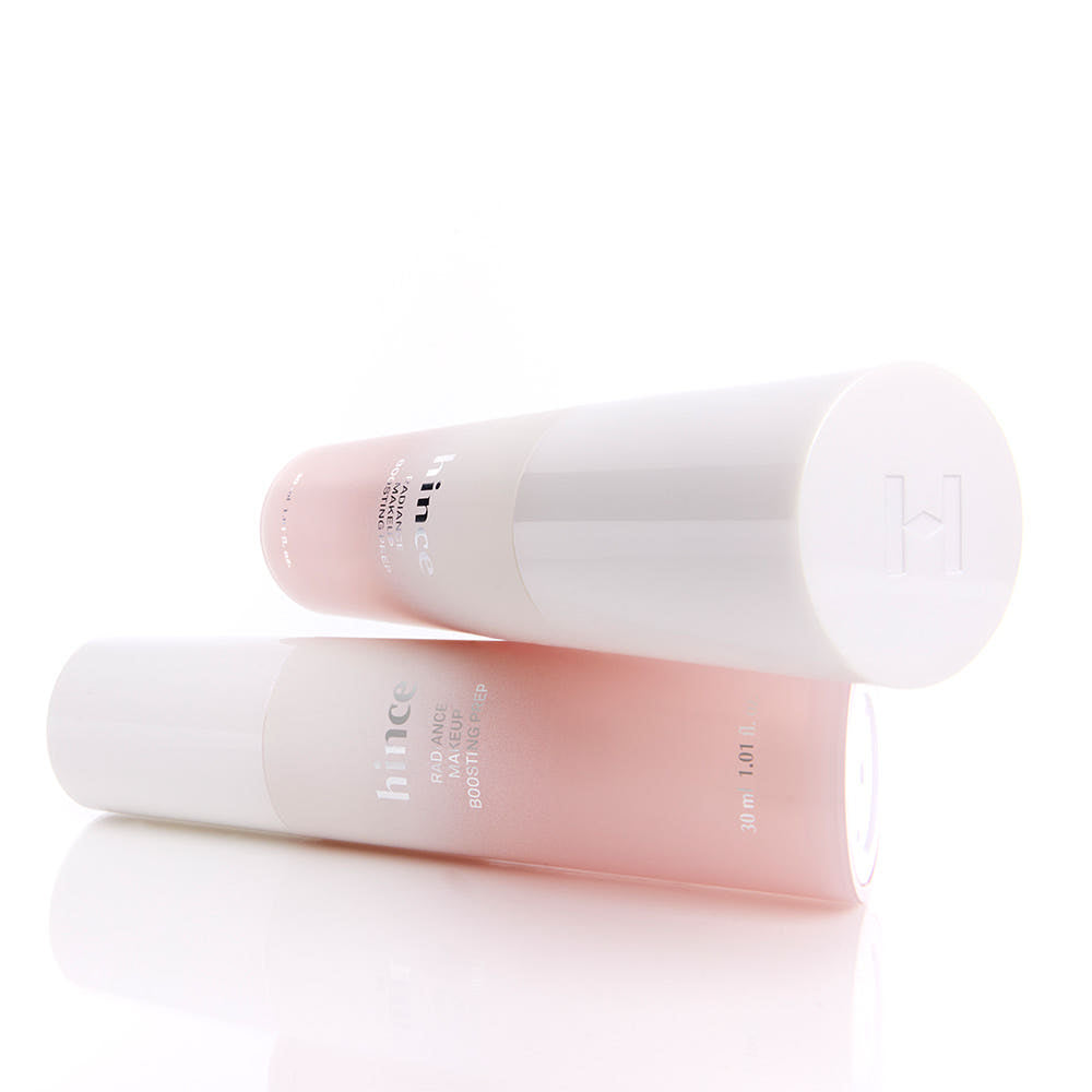 Décris l'image en français: HINCE  Radiance Makeup Boosting Prep 30ml de HINCE, tube rose sur fond blanc.