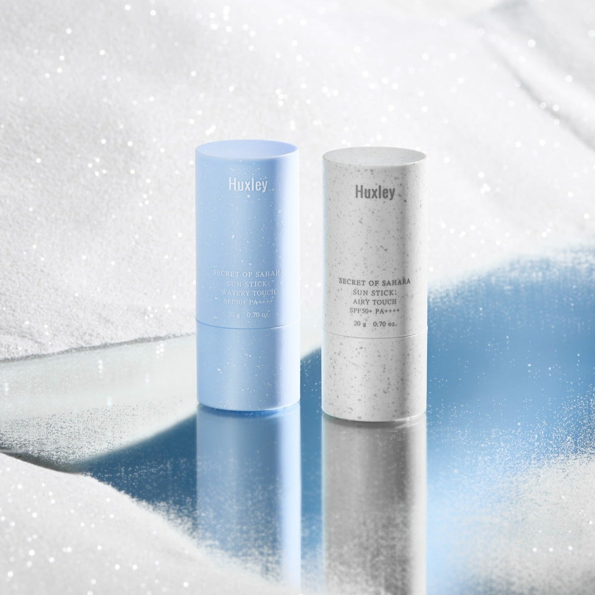 Décris l'image en français en mentionnant le produit, la marque et le contexte visuel. HUXLEY Sun Stick Airy Touch 20g