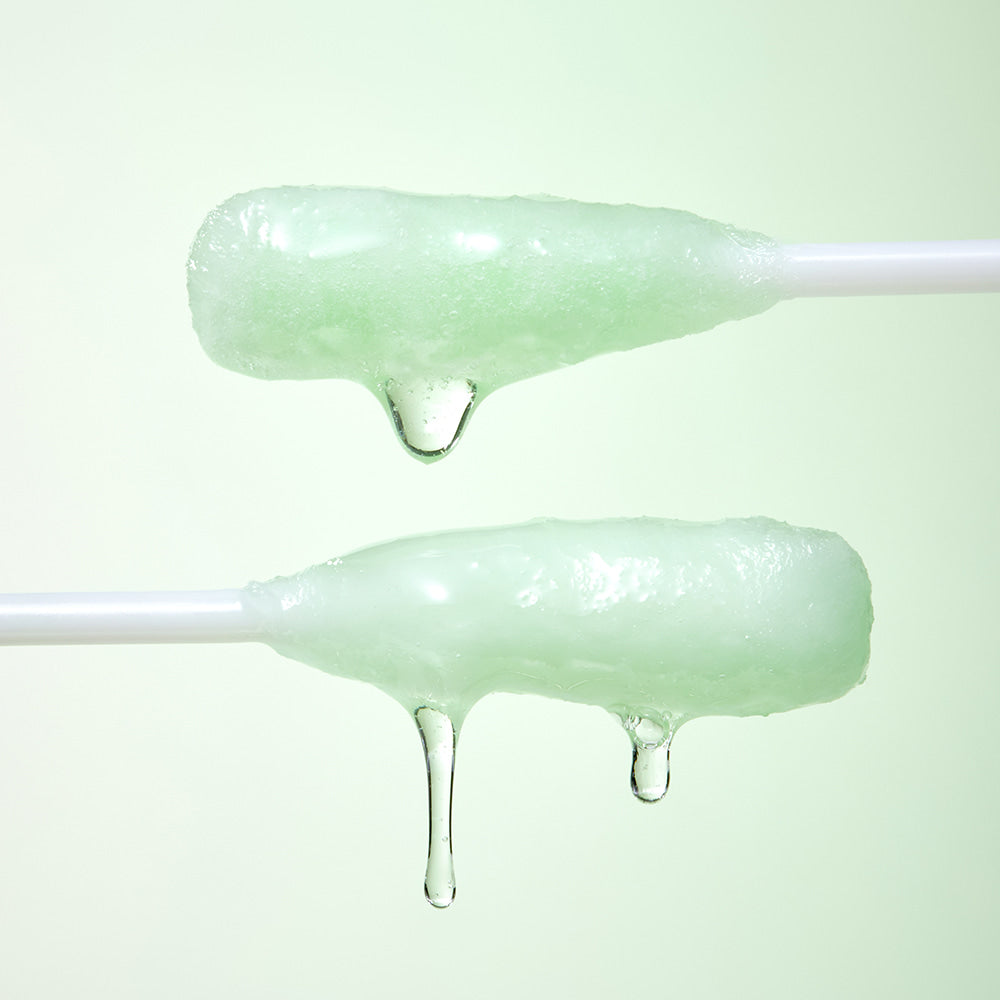 ILSO No Trouble Peeling Swab 8 sheets, coton-tiges verts ILSO sur fond clair, gros plan stérile.