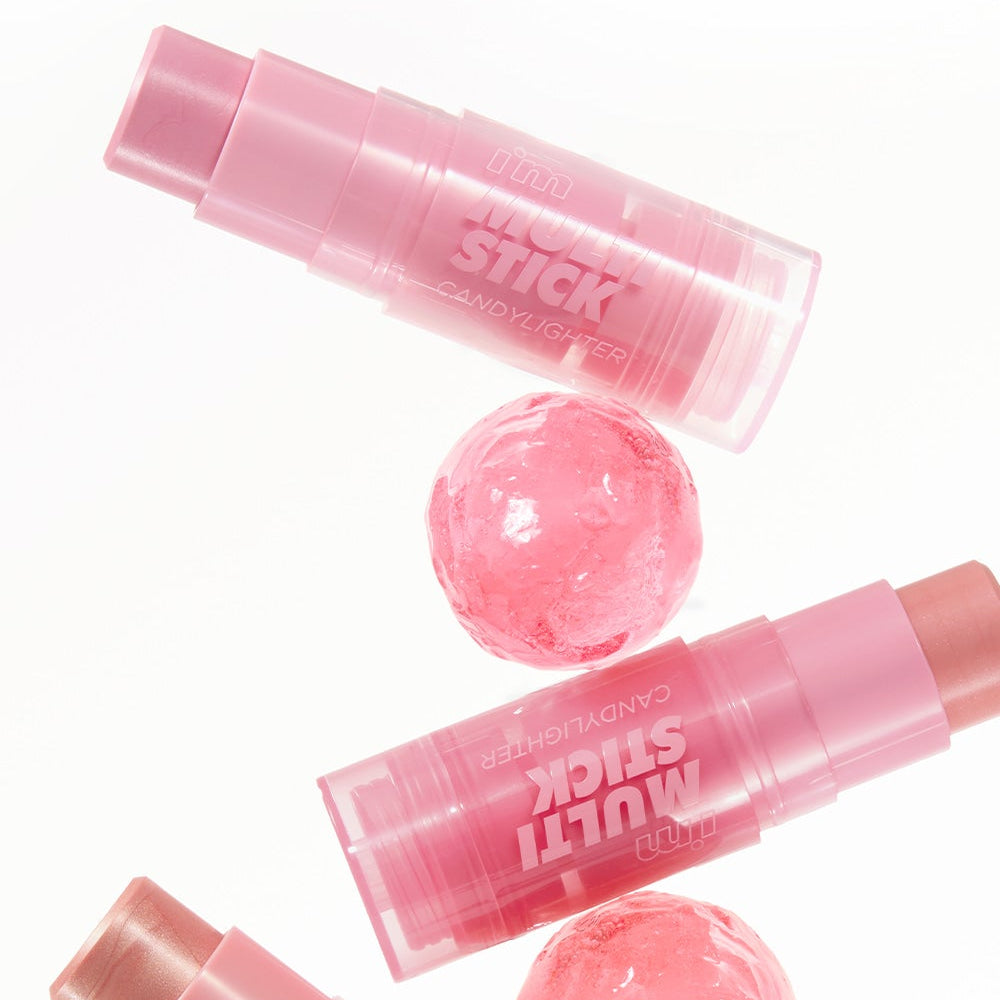 I'M MEME Multi-Stick Candy Lighter de la marque I'M MEME, stylo-briquet rose, bonbon translucide sur fond clair