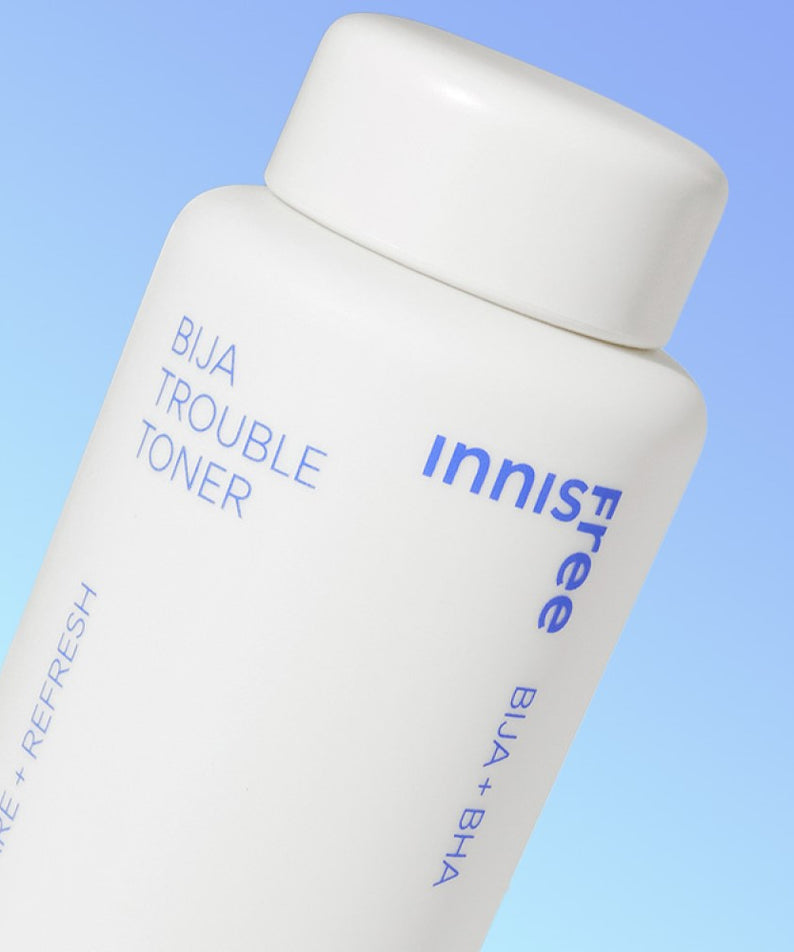 Produit cosmétique INNISFREE Bija Trouble Toner 170ml en bouteille blanche, idéal pour soins de la peau et problèmes cutanés.
