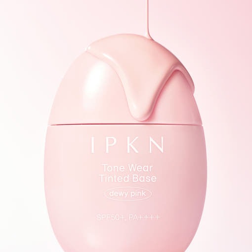IPKN  Tonewear Tinted Tone-Up Base 40ml SPF50+ PA++++, flacon rose sur fond clair, visuel produit beauté