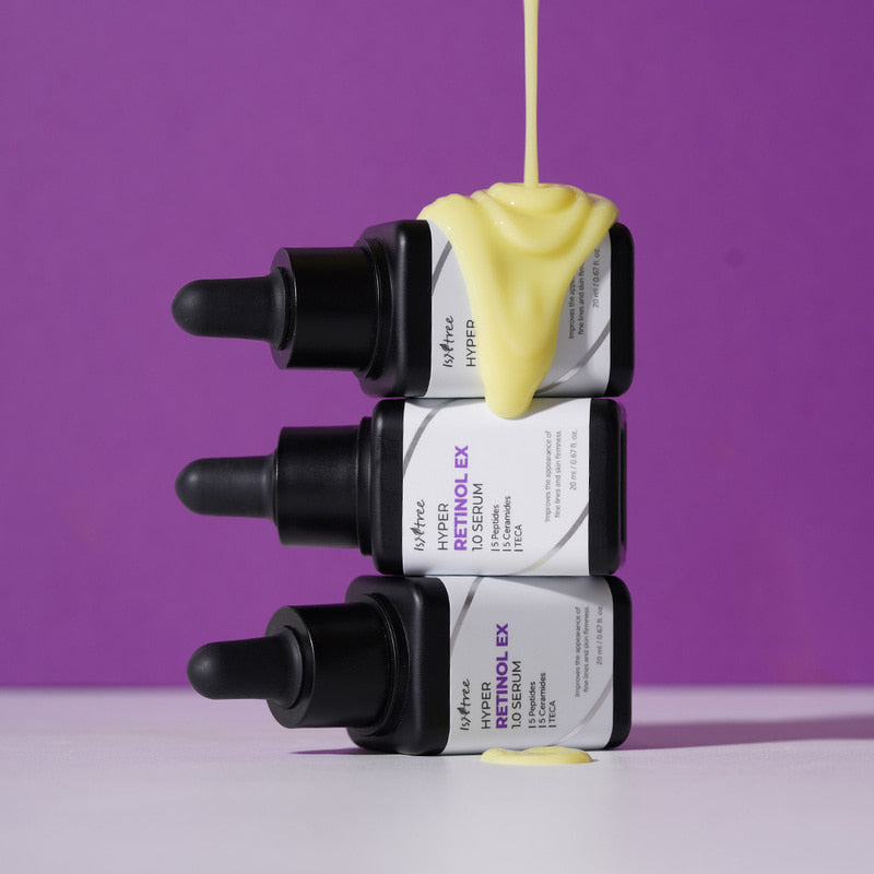 ISNTREE Hyper Retinol EX 1.0 Serum 20ml, flacons noirs avec sérum jaune sur fond violet, marque ISNTREE