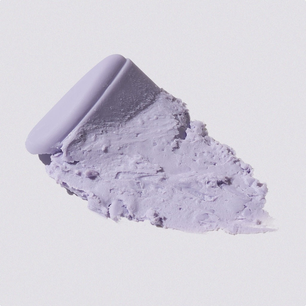 ISNTREE  Onion Fresh Light Sun Stick 22g : stick solaire marque ISNTREE, texture crème mauve sur fond clair.
