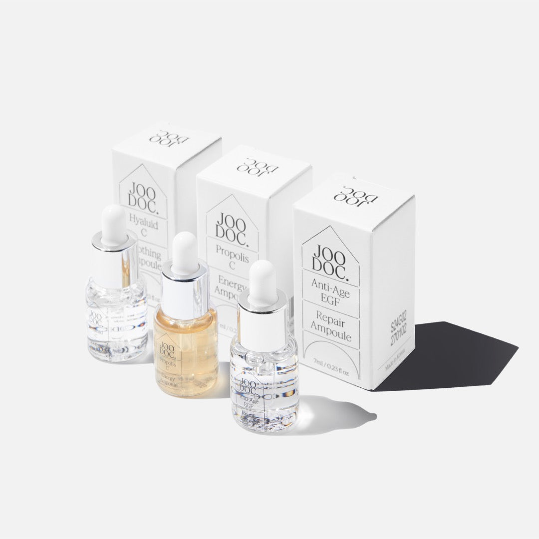 JOODOC  Barrier Glow 3-Piece Ampoule Routine Kit : ampoules et boîtiers blancs sur fond clair, routine barrière lumineuse.