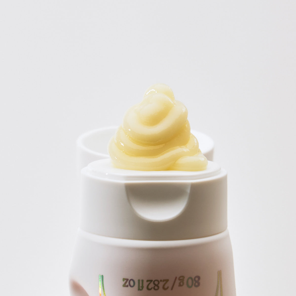 JOODOC  Collagen High-Nutrient Radiance Pack 80ml : pot crème blanc, texture jaune, fond clair minimaliste