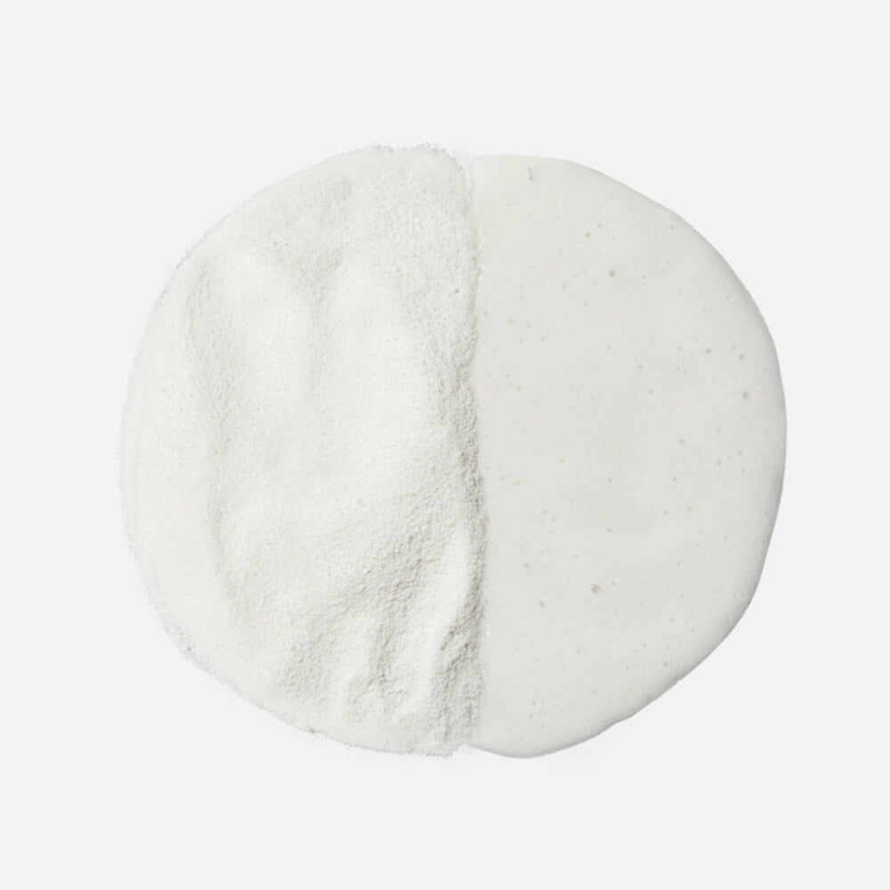 Décris l'image en français : JOODOC  Pore Deep Enzyme Microfoliant 60g, poudre exfoliante blanche, marque JOODOC sur fond clair.
