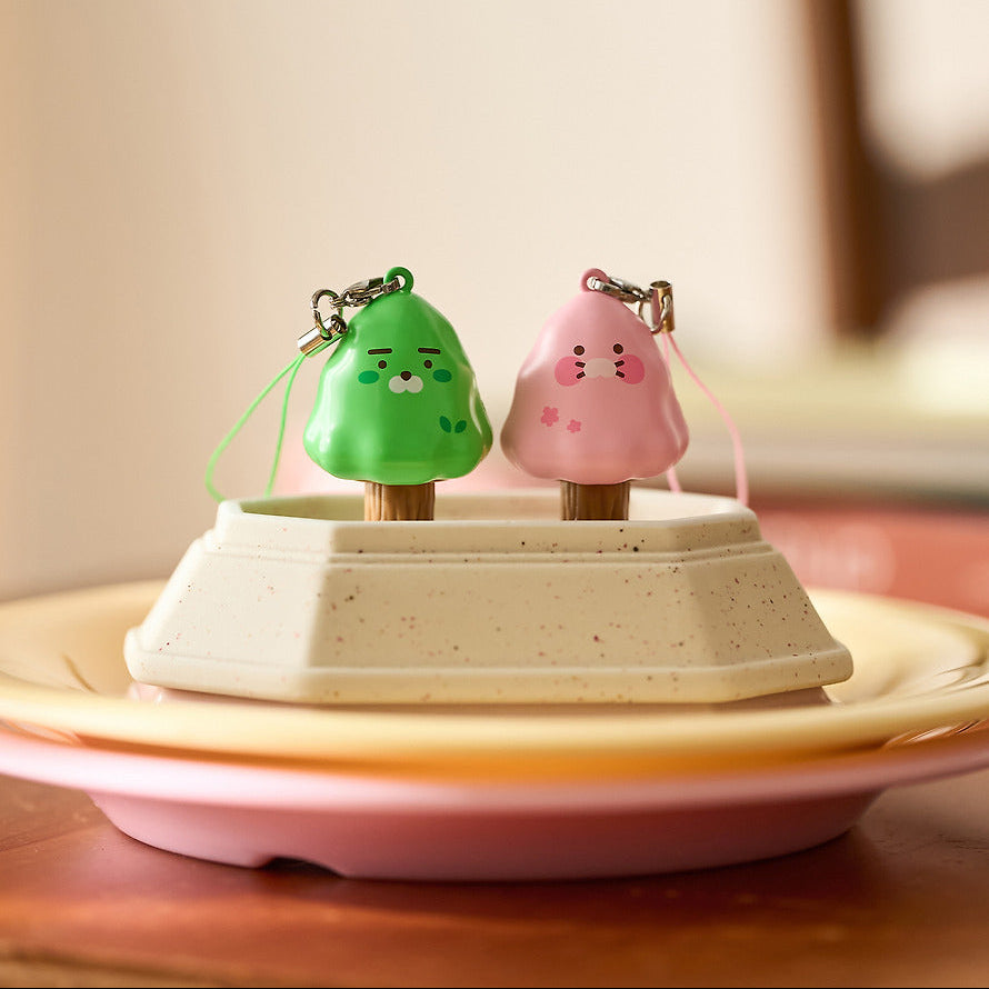 KAKAO FRIENDS Peekaboo Moving Keyring de marque Kakao Friends, figurines mobiles vert et rose sur plateau, intérieur doux.