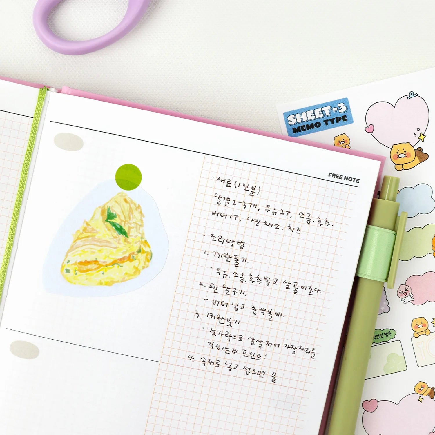 KAKAO FRIENDS Planner 2026 de marque Kakao Friends, pages colorées et animaux, vue rapprochée sur l’agenda.